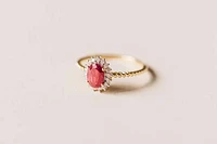 Halo Ring with .13 Carat TW of Diamonds and 7x5MM Oval Ruby 10kt Yellow Gold