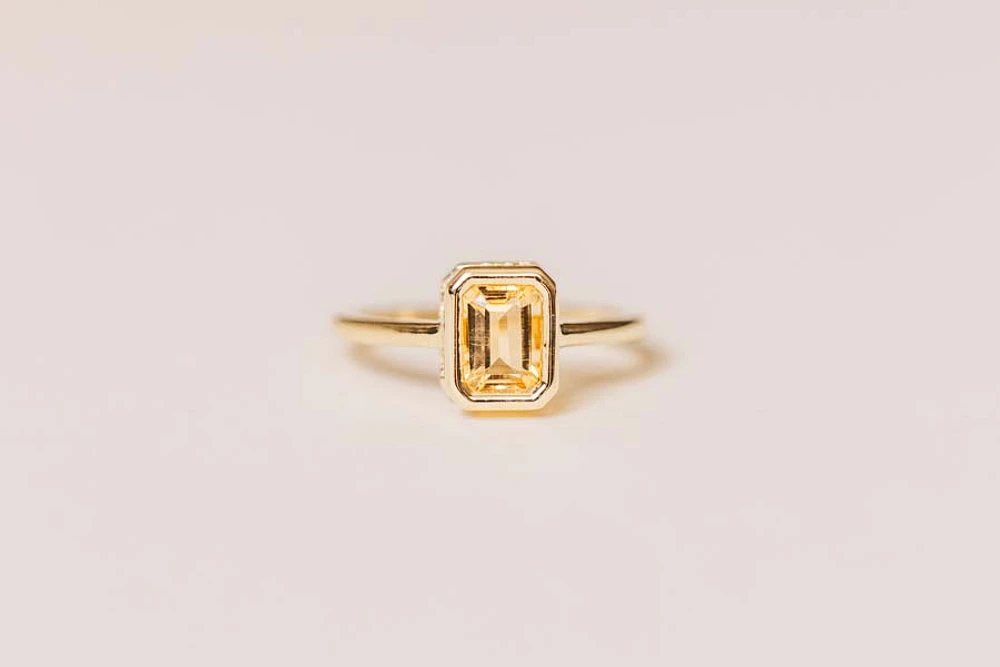 Ring with 7x5MM Emerald Cut Citrine 10kt Yellow Gold