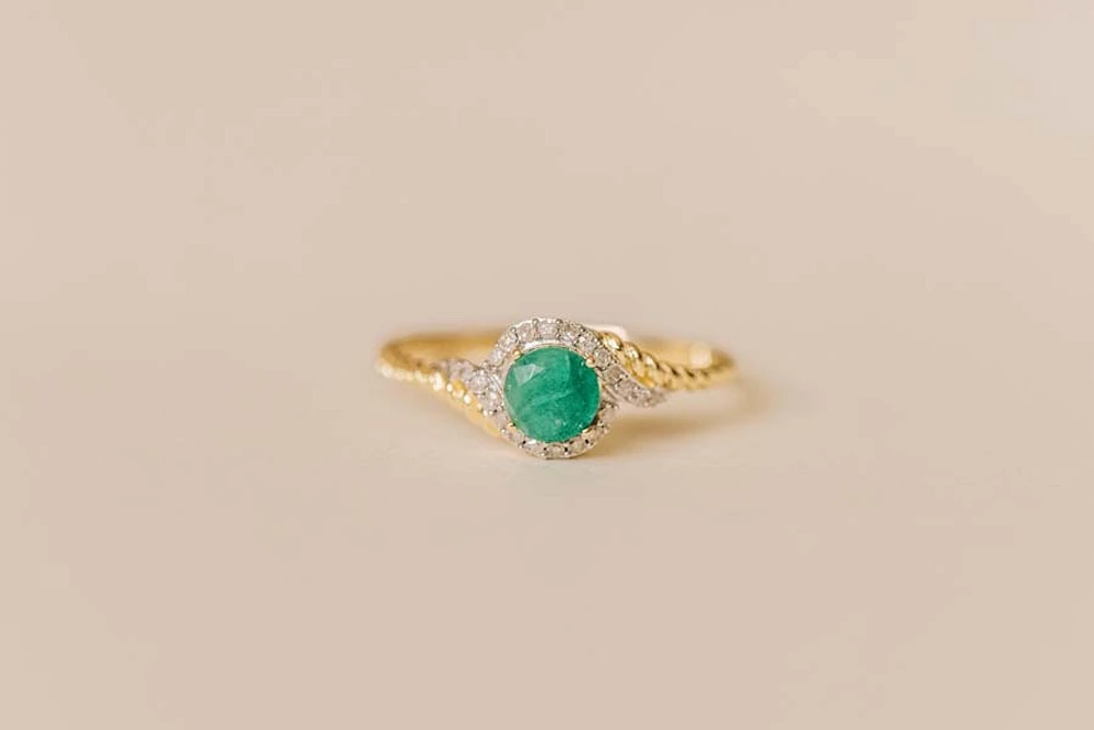 Halo Ring with .10 Carat TW of Diamonds and 5MM Emerald 10kt Yellow Gold