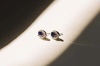 Halo Earrings with .17 Carat TW of Diamonds and 6x4MM Oval Blue Sapphire 10kt White Gold