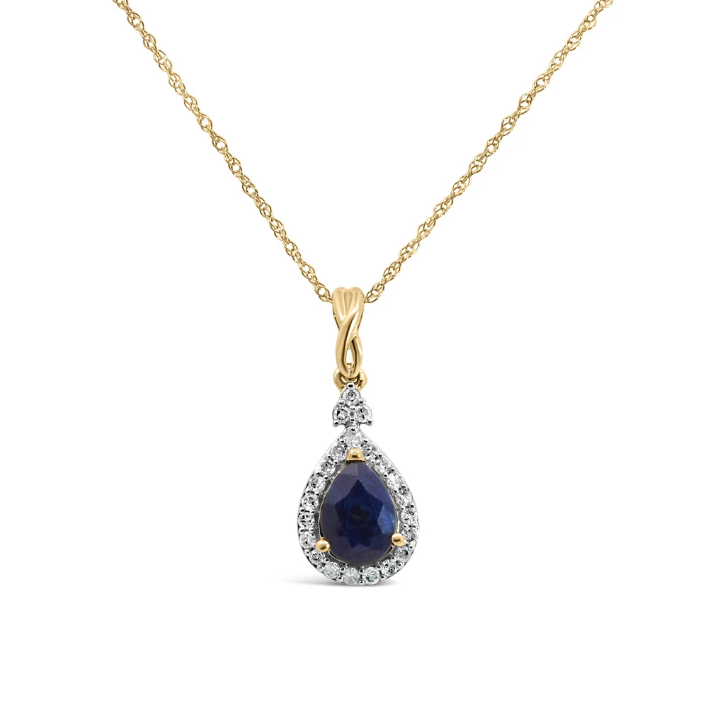 Halo Pendant with .13 Carat TW of Diamonds and 7x5MM Pear Shape Blue Sapphire 10kt Yellow Gold Chain