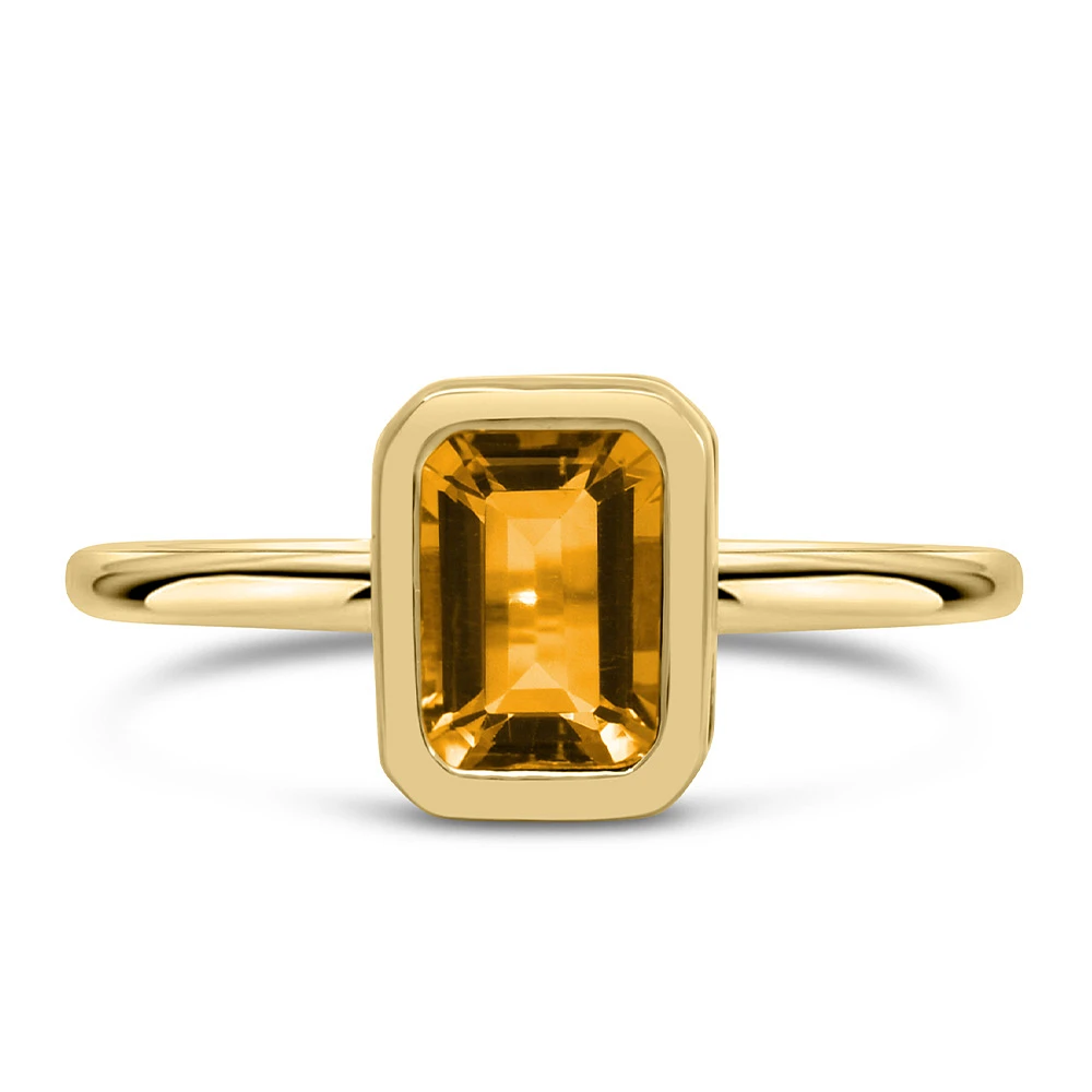 Ring with 7x5MM Emerald Cut Citrine 10kt Yellow Gold