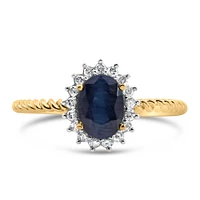 Halo Ring with .13 Carat TW of Diamonds and 7x5MM Oval Blue Sapphire 10kt Yellow Gold