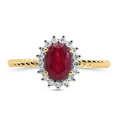 Halo Ring with .13 Carat TW of Diamonds and 7x5MM Oval Ruby in 10kt Yellow Gold