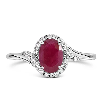 Halo Ring with .10 Carat TW of Diamonds and 7x5MM Oval Ruby in 10kt White Gold