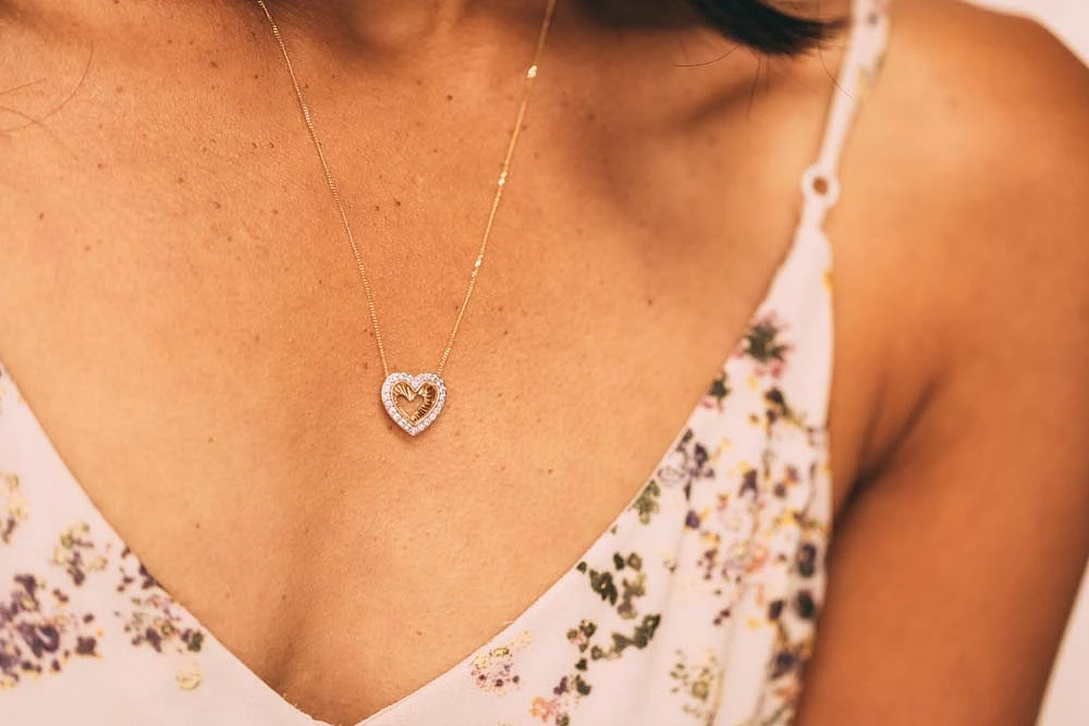 Heart Pendant with .25 Carat TW of Diamonds 10kt Yellow Gold Chain