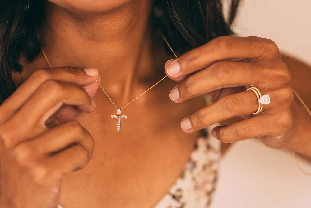 Cross Pendant with .13 Carat TW of Diamonds in 10kt Yellow Gold with Chain