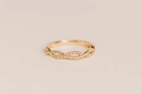 Infinity Ring with .20 Carat TW of Diamonds in 10kt Gold