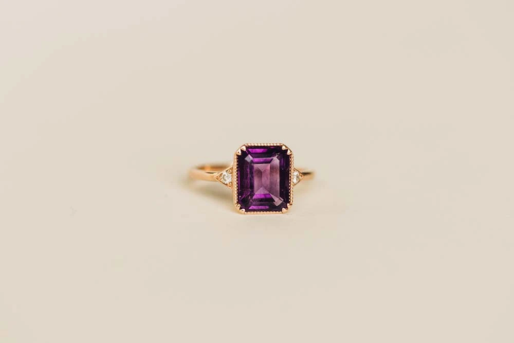 Ring with 10X8MM Emerald Cut Amethyst and .06 Carat TW of Diamonds in 14KT Rose Gold