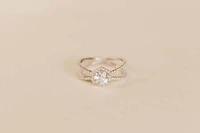 Ring with 6MM Round Aquamarine and .26 Carat TW of Diamonds in 14KT White Gold