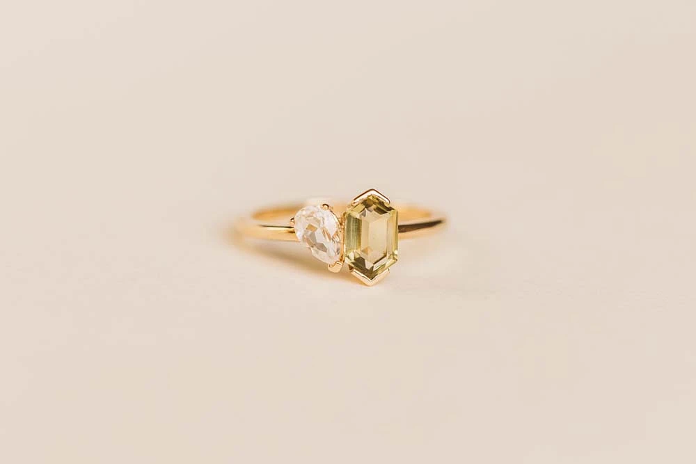 Ring with 7X5MM Elongated Hexagon Olive Quartz and White Topaz in 14KT Yellow Gold