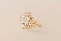 Ring with 8X6MM Emerald Cut Green Amethyst and White Topaz in 14KT Yellow Gold