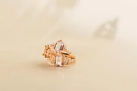 Ring with 5X9MM Elongated Hexagon Pink Amethyst and .32 Carat TW of Diamonds in 14KT Rose Gold