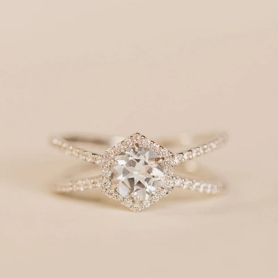 Ring with 6MM Round Aquamarine and .26 Carat TW of Diamonds in 14KT White Gold
