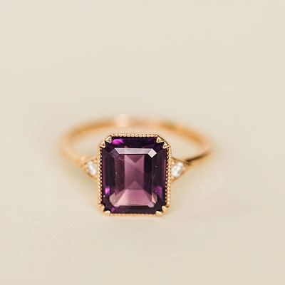 Ring with 10X8MM Emerald Cut Amethyst and .06 Carat TW of Diamonds in 14KT Rose Gold