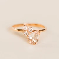 Ring with 8X6MM Pear Shape Morganite and .20 Carat TW of Diamonds in 14KT Rose Gold
