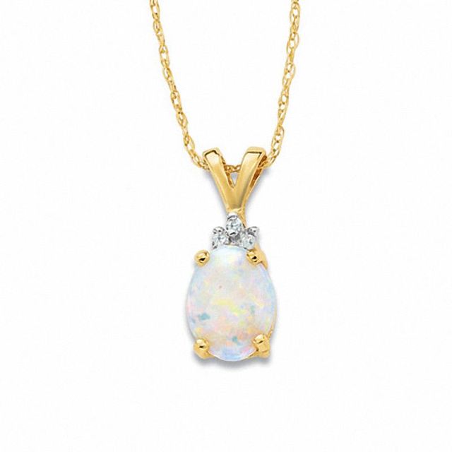 Oval Opal Pendant in 10K Gold with Tri-Top Diamond Accents|Peoples Jewellers