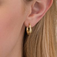0.25 CT. T.W. Channel-Set Diamond Oval Hoop Earrings in 10K Gold|Peoples Jewellers
