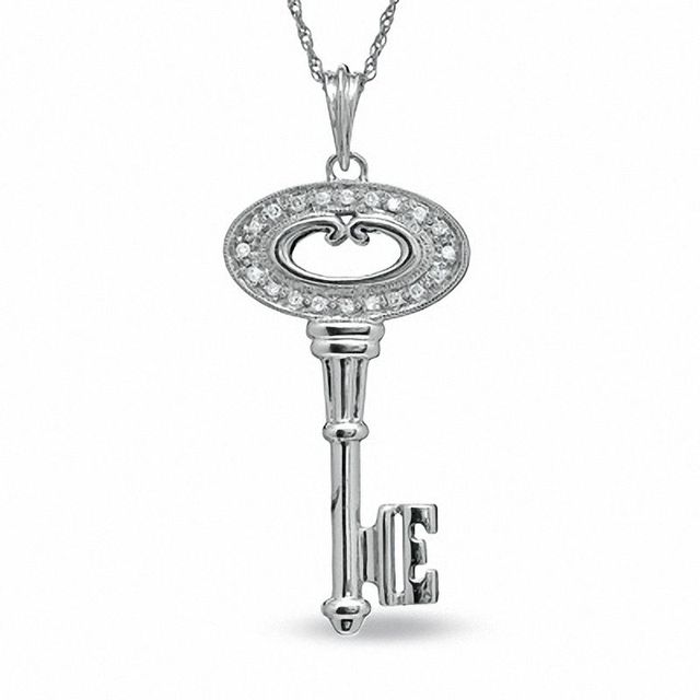 0.10 CT. T.W. Diamond Oval Key Pendant in Sterling Silver