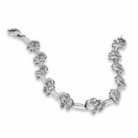 0.20 CT. T.W. Diamond Interlocking Hearts Link Bracelet in Sterling Silver|Peoples Jewellers