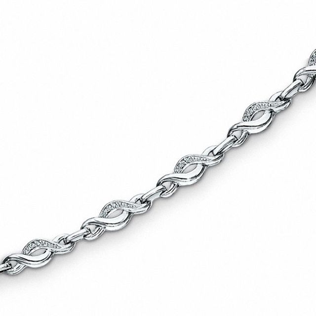 0.085 CT. T.W. Diamond Twist Bracelet in Sterling Silver - 7.25"|Peoples Jewellers