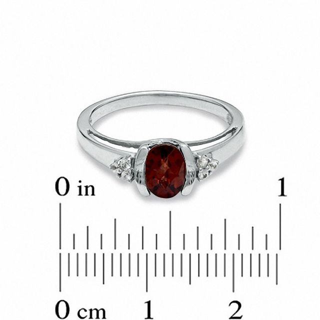 Oval Garnet and White Sapphire Bezel-Set Ring in 10K White Gold