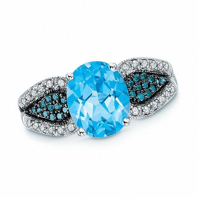 Oval Swiss Blue Topaz and 0.27 CT. T.W. Enhanced Blue and White Diamond Ring in 10K White Gold|Peoples Jewellers