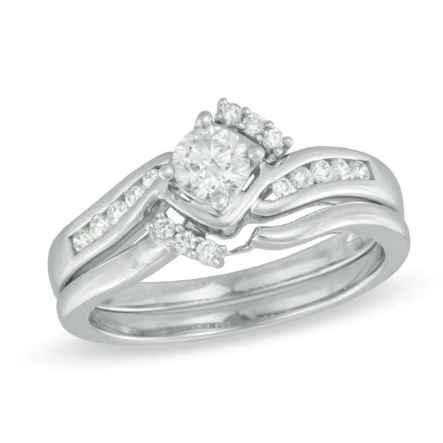 0.50 CT. T.W. Diamond Tilted Bypass Bridal Set in 10K White Gold