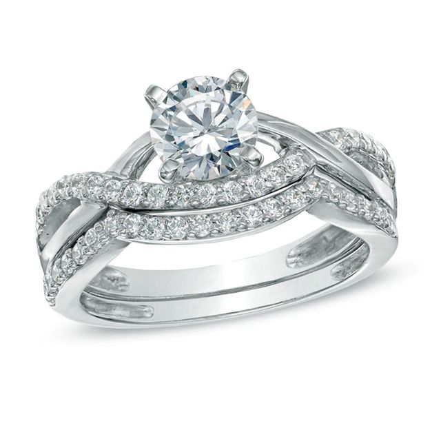 1.10 CT. T.W. Canadian Certified Diamond Split Shank Bridal Set in 14K White Gold (I/I2)