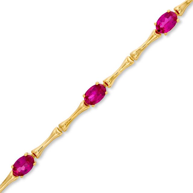 Oval Lab-Created Ruby Bracelet in Sterling Silver with 14K Gold Plate - 7.25"|Peoples Jewellers
