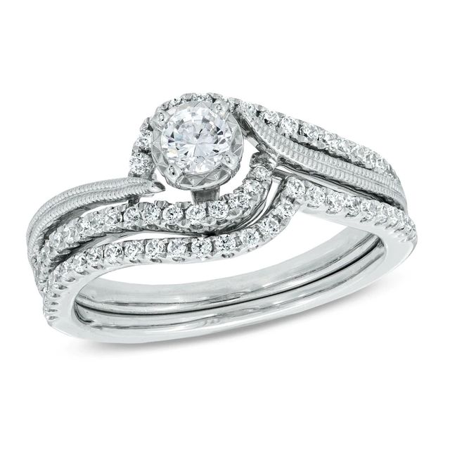 0.50 CT. T.W. Diamond Frame Swirl Bridal Set in 10K White Gold