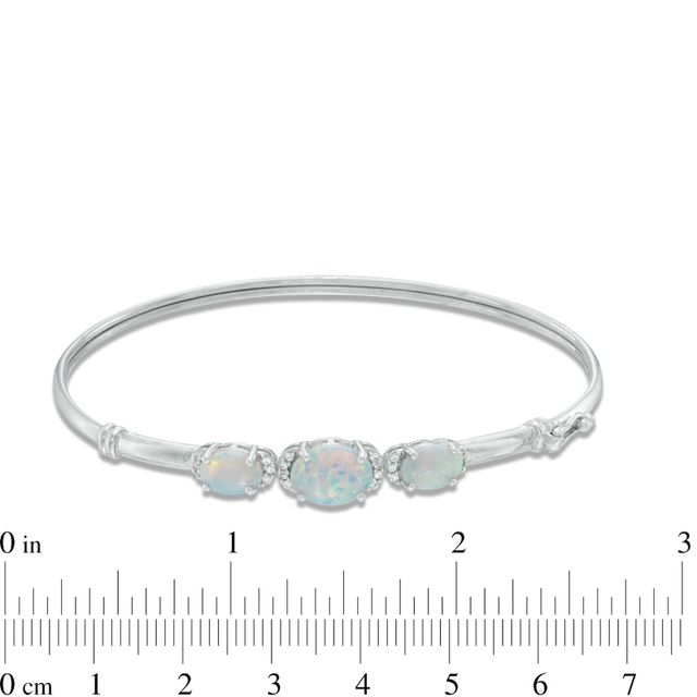 Oval Lab-Created Opal and White Sapphire Three Stone Bangle in Sterling Silver|Peoples Jewellers