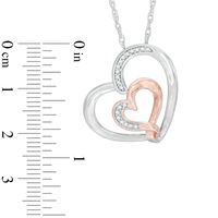 0.12 CT. T.W. Diamond Double Heart Pendant in Sterling Silver and 14K Rose Gold Plate|Peoples Jewellers