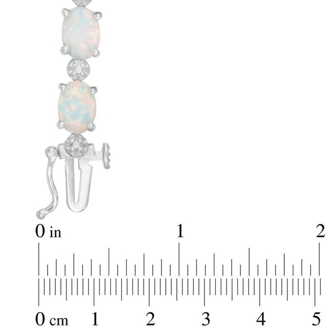 Oval Lab-Created Opal and Diamond Accent Line Bracelet in Sterling Silver - 7.5"