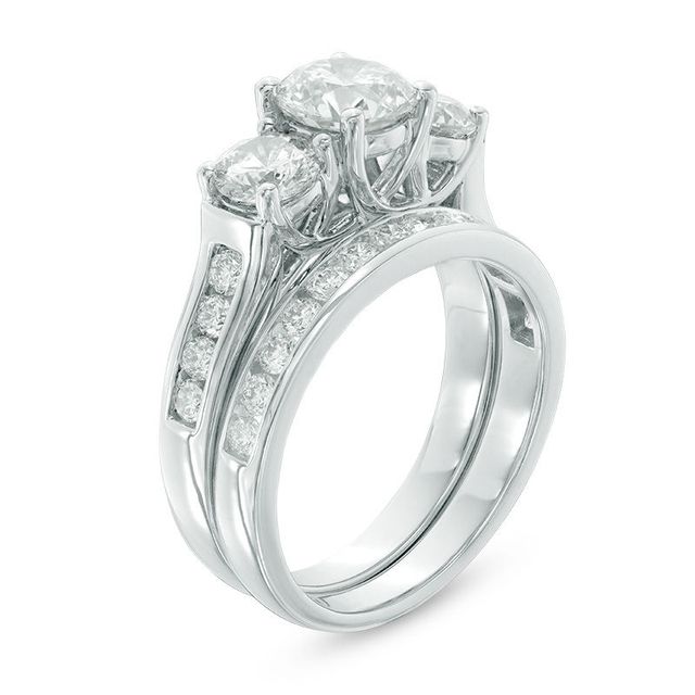 2.69 CT. T.W. Certified Canadian Diamond Past Present Future® Bridal Set in 14K White Gold (J/I2)