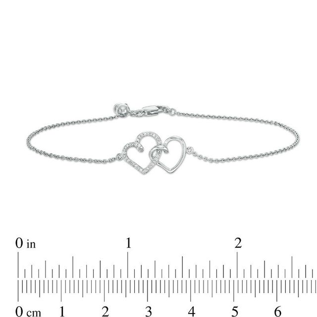 0.04 CT. T.W. Diamond Interlocking Hearts Bracelet in Sterling Silver - 6.75"