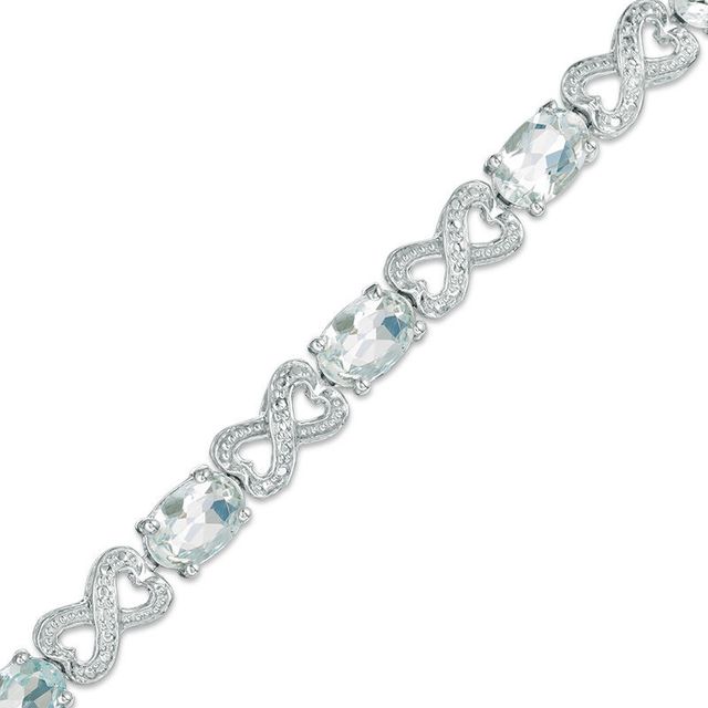 Oval Aquamarine and Diamond Accent Heart-Shaped Infinity Bracelet in Sterling Silver - 7.25"|Peoples Jewellers