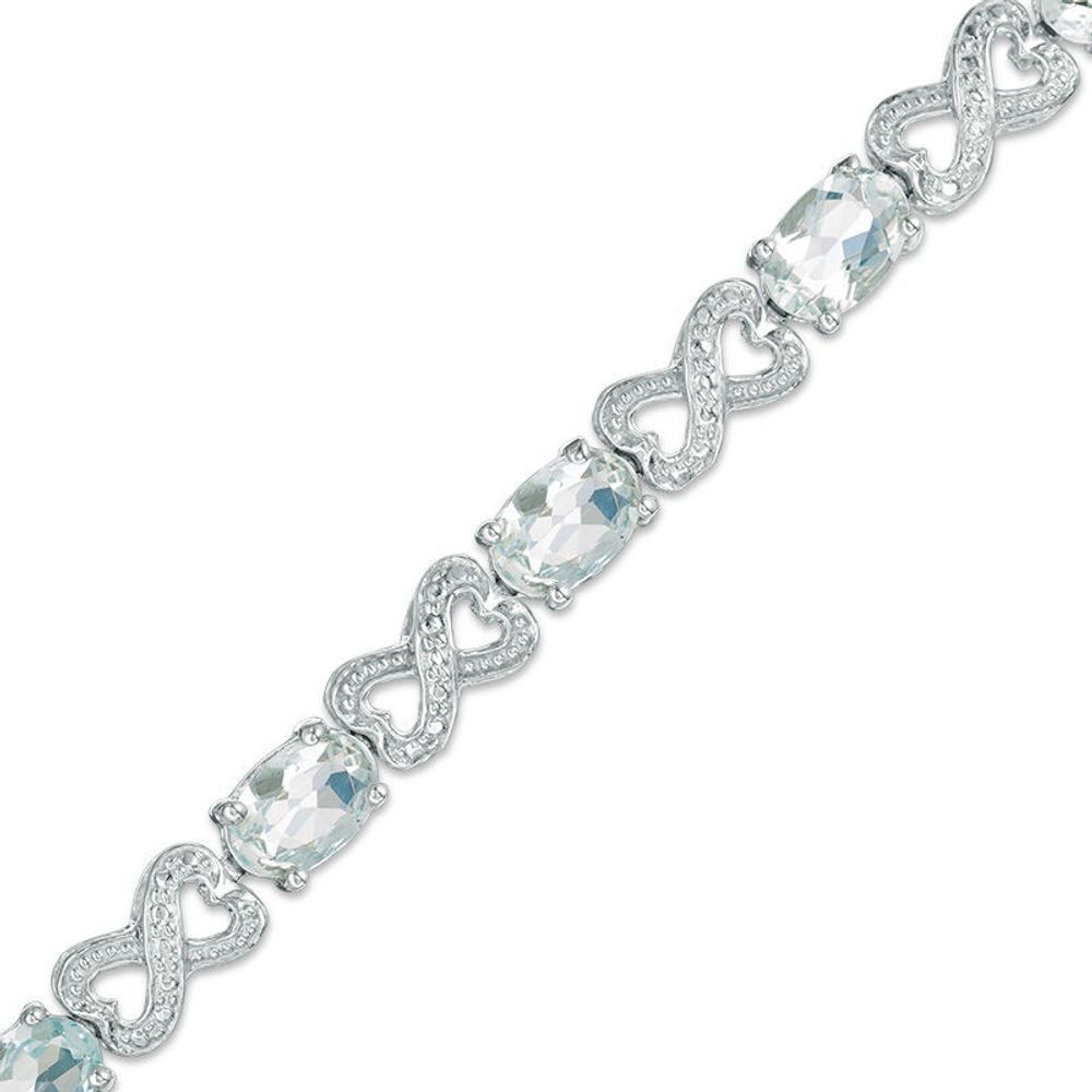 Oval Aquamarine and Diamond Accent Heart-Shaped Infinity Bracelet in Sterling Silver - 7.25"|Peoples Jewellers