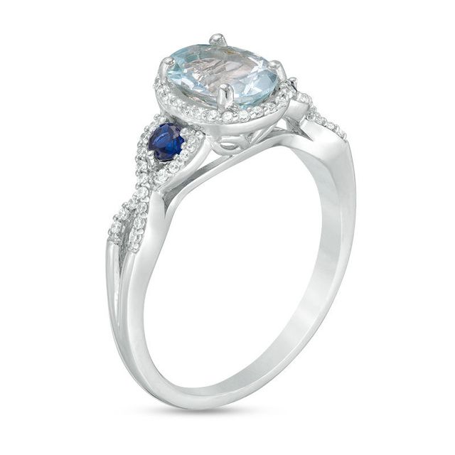 Oval Aquamarine with Lab-Created Blue and White Sapphire Frame Twist Shank Ring in 10K White Gold|Peoples Jewellers