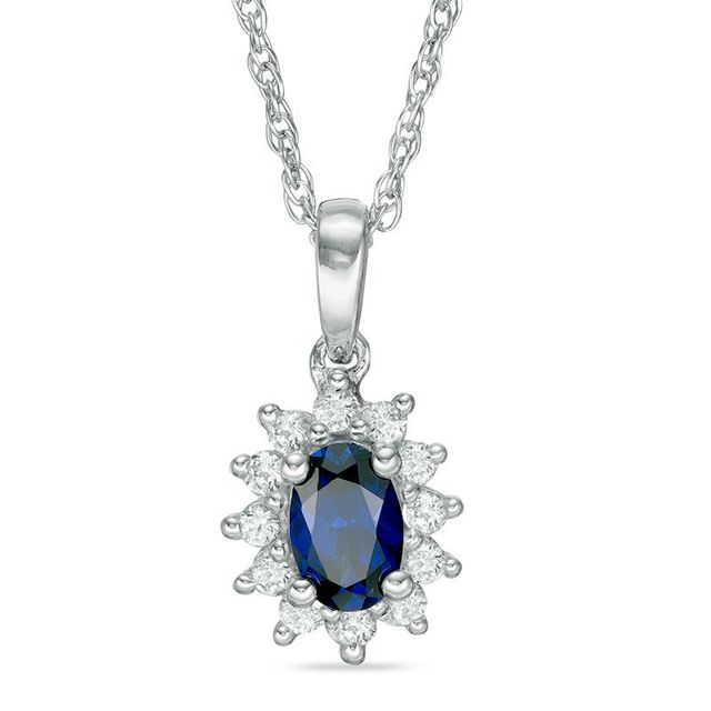 Oval Blue Sapphire and 0.18 CT. T.W. Diamond Starburst Frame Pendant in 10K White Gold|Peoples Jewellers