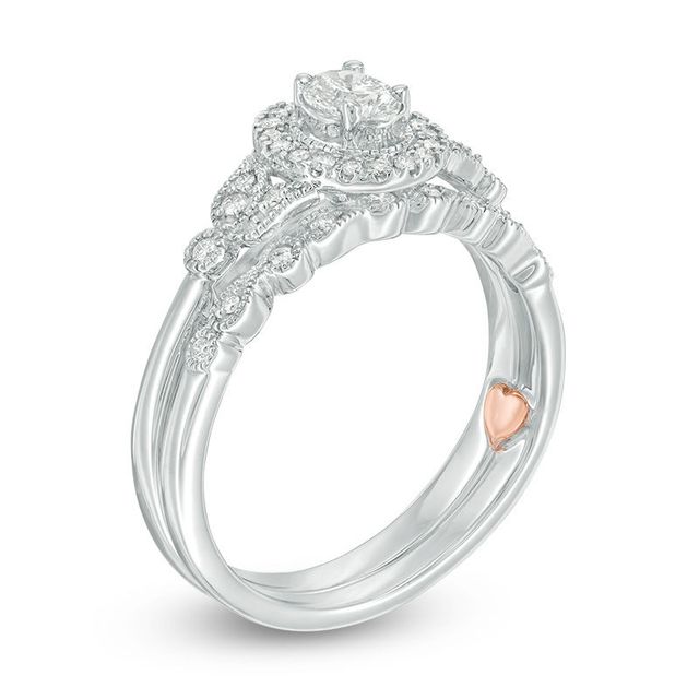 Perfect Fit 0.50 CT. T.W. Oval Diamond Frame Vintage-Style Interlocking Bridal Set in 10K White Gold|Peoples Jewellers