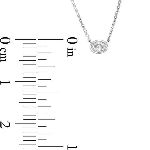 0.09 CT. Oval Diamond Solitaire Necklace in 10K White Gold