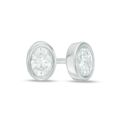 0.15 CT. T.W. Oval Diamond Solitaire Stud Earrings in 10K White Gold|Peoples Jewellers