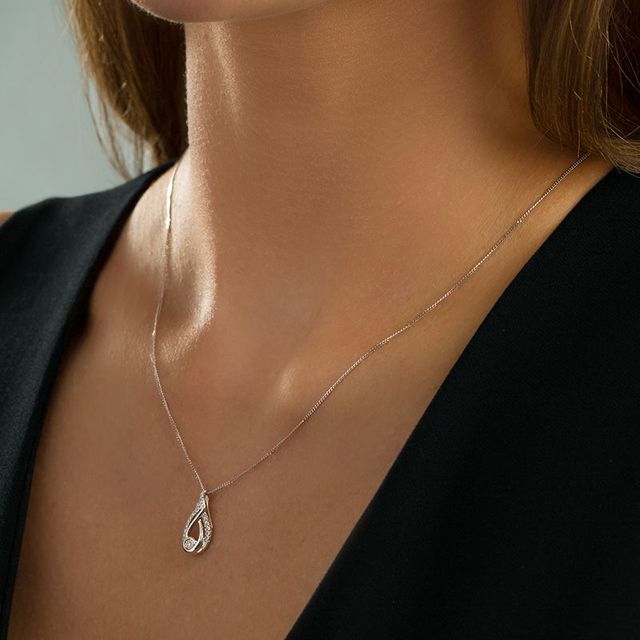 Interwoven™ 0.09 CT. T.W. Diamond Pendant in Sterling Silver - 19"|Peoples Jewellers