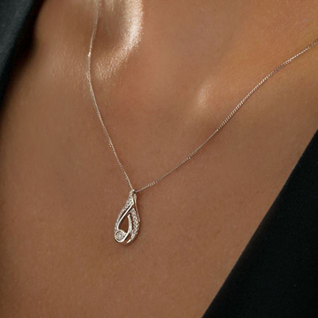 Interwoven™ 0.09 CT. T.W. Diamond Pendant in Sterling Silver - 19"|Peoples Jewellers