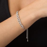 0.10 CT. T.W. Diamond Interlocking Curb Link Bolo Bracelet in Sterling  - 9.5"|Peoples Jewellers