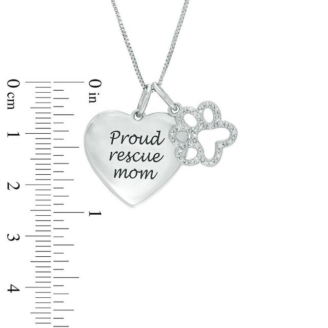 0.10 CT. T.W. Diamond Paw Print Outline and "Proud rescue mom" Heart Charm Pendant in Sterling Silver