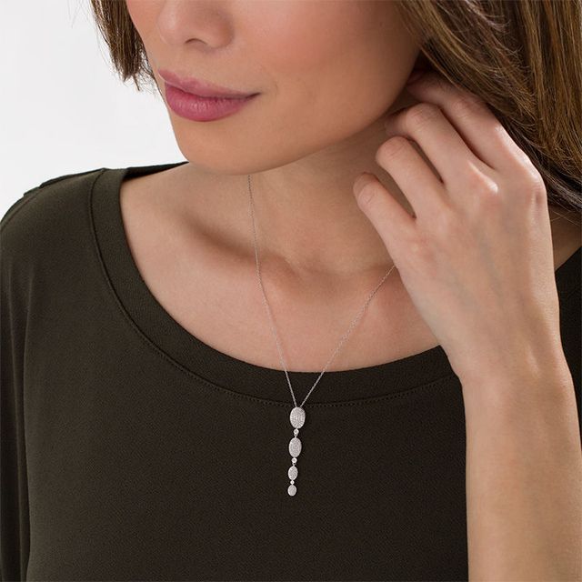 0.085 CT. T.W. Oval Composite Diamond Quad Drop Pendant in 10K White Gold|Peoples Jewellers