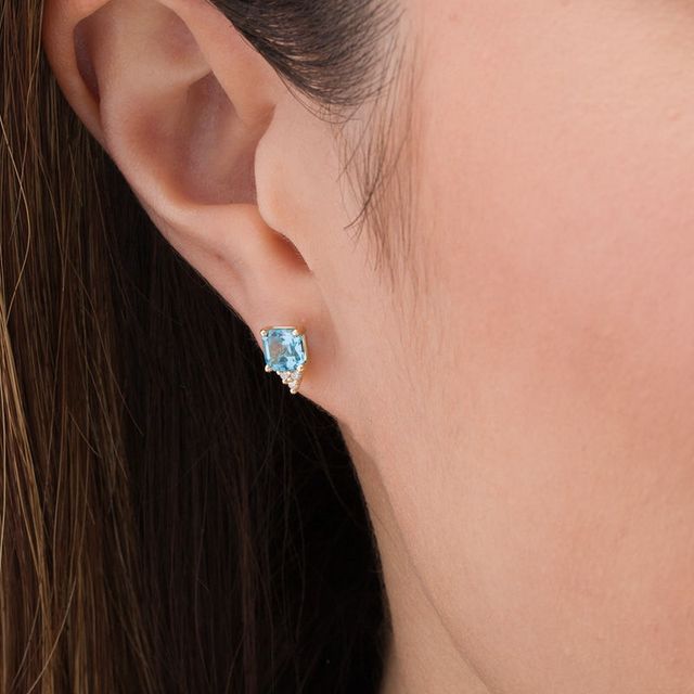 5.0mm Asscher-Cut Swiss Blue Topaz and 0.05 CT. T.W. Diamond Tri-Top Stud Earrings in 10K Gold|Peoples Jewellers