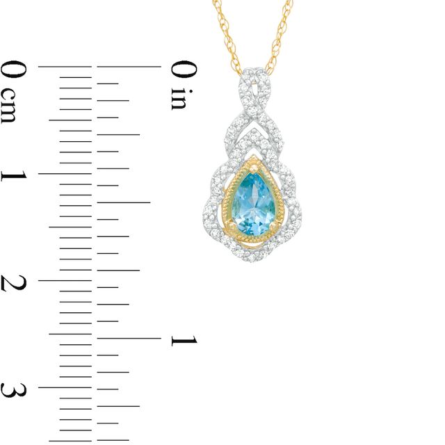 Pear-Shaped Swiss Blue Topaz and 0.15 CT. T.W. Diamond Scallop Frame Ornate Pendant in 10K Gold|Peoples Jewellers